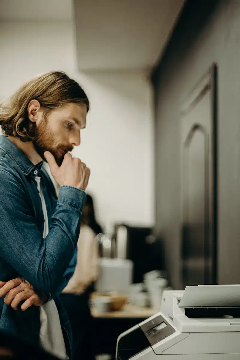 Man Using A Printer